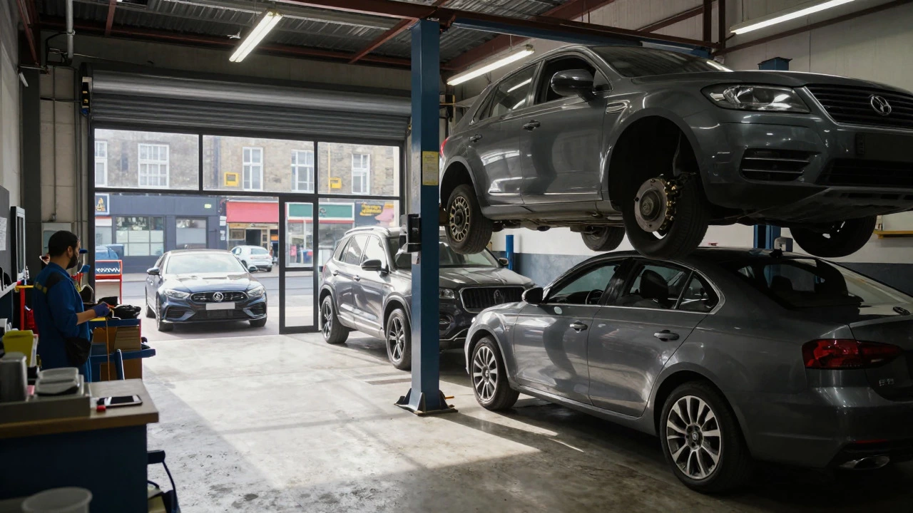 Wide view of an auto repair shop with various cars on lifts